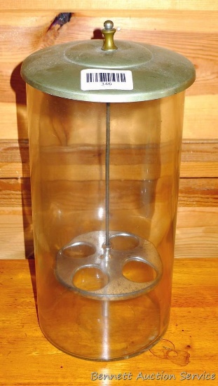 Heavy glass ice cream cone keeper as was in the drug stores and soda fountains. Stands 14" tall.