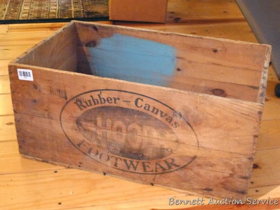 Really neat Rubber Canvas Hood Footwear crate is 16" x 27" x 12" tall. Some water damage and such,