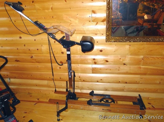 Nordic Track ski exerciser comes with owner's guide. Screen turns on. Stands about 6' x 2' x 66"