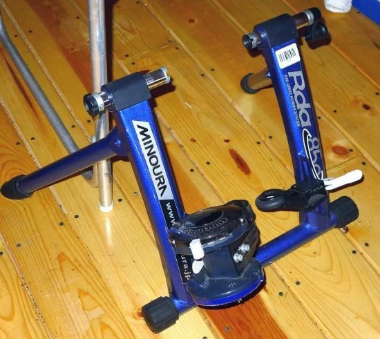 Minoura RDA-850LW Rim Drive Action System exercise machine comes with manual. Measures about 26" x