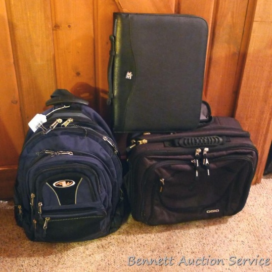 Three nice travel bags. One computer bag is 16" wide, back pack is 20" high. Portfolio. All look in