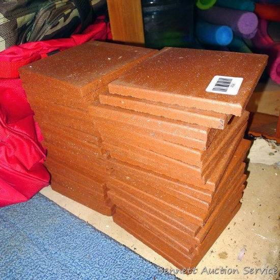 Forty pieces of slip resistant 6" square terra cotta tile.