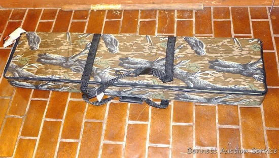Lakewood camo hardside padded gun case measures 11" x 48" x 4". Case shows little to no use. Sturdy