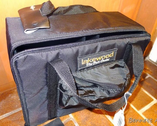 Lakewood professional tackle box has hard sides and nylon shell. New with tags.