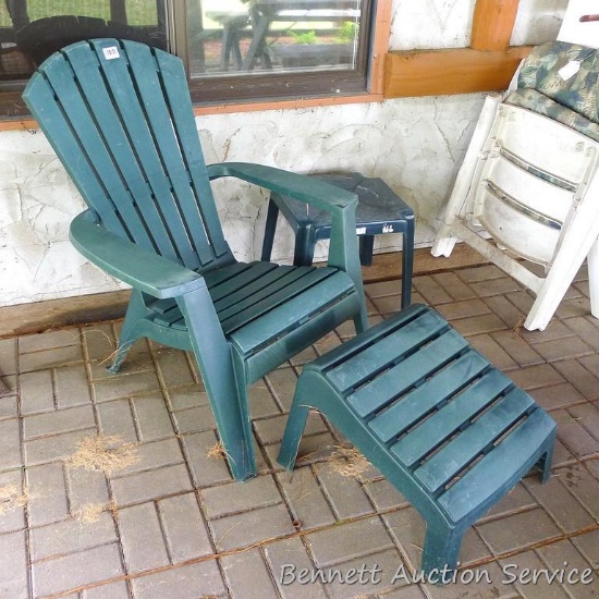 Resin Adirondack chair with ottoman, plus a little resin side table. Both pieces in good shape.