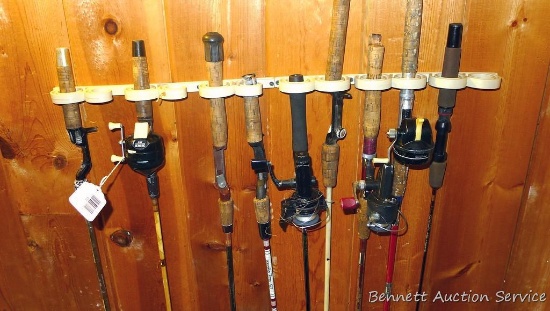 Nine fishing poles up to 7'. Include two reels by Abu Garcia Cardinal 753, plus Johnson and Zebco.