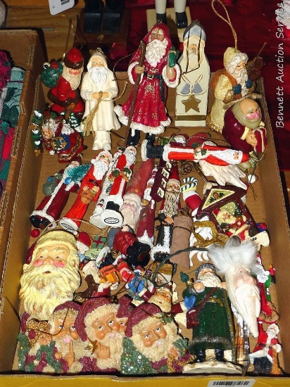 Nicely organized display of Santa Christmas ornaments, tallest is approx. 7".