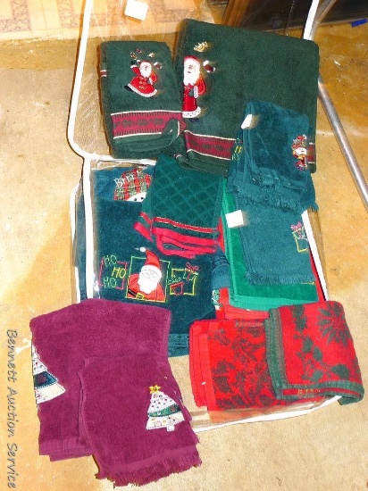 Bathroom Christmas towels in good condition, stored in zippered tote.