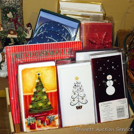 Variety of Christmas cards ready to send greetings.