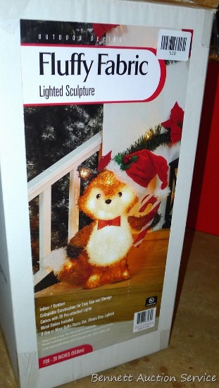 Fluffy Fabric lighted fox stands 20" tall and comes with original box.