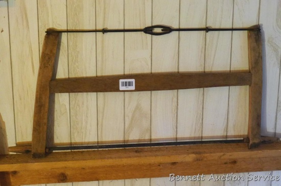 Antique wooden buck saw. In good condition. Measures 33 in. x 13 in.