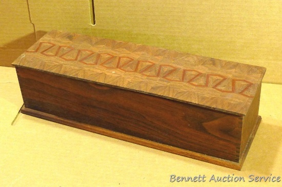 Candle box made with cherry, walnut, and mahogany. In good condition. Measures 13.25 in. x 4.25 in.