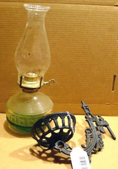 Lot of kerosene lantern parts including wall hanging bracket. Chimney measures 10 in. tall