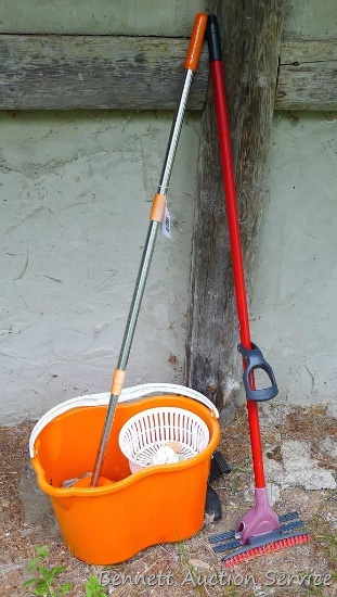 Spinner-style mop bucket with two mops.