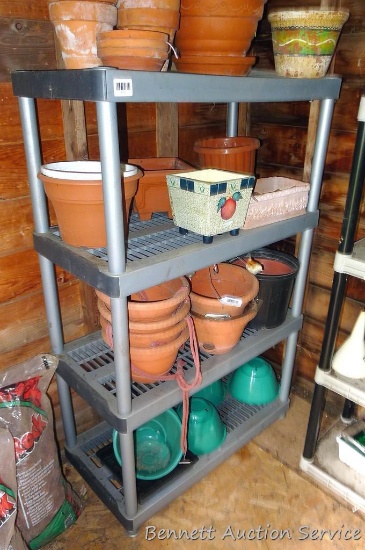 Rust proof shelving unit measures 56" x 36" x 18".