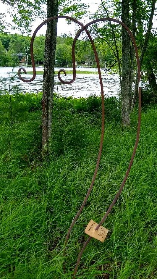 Two heavy duty wrought iron bird feeder or flower basket hangers, each approx. 6'.