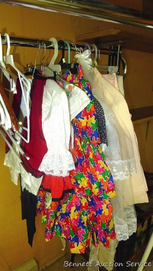 Vintage girls clothing including miniature bride or confirmation dress; pink denim jacket, skirts,