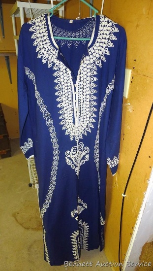 Pretty embroidered dress has a tag marked 46 and measures from shoulder to hem 54".