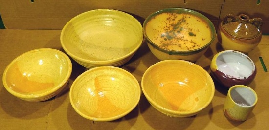 Lot of 8 hand made ceramic pieces, mostly bowls, by Irene Gimeno. All appear in good condition.
