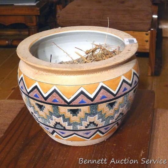 Patterned flower pot is about 13" x 10" high. Small crack noted on rim.