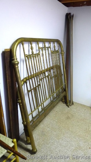 Pretty antique brass bed frame is in good condition. Headboard measures 55"