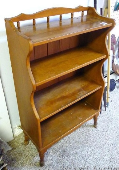 Handy little shelf stands 38" x 24" wide x 10". Sturdy and in good condition.