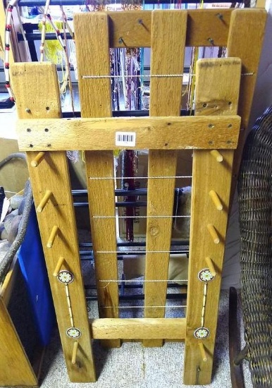 Rustic display rack with Native American beaded accents. Measures approx. 42" x 20". Plus another