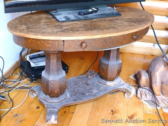 Antique library table is ready to be restored. Table has great character, measures 4' wide x 28" x