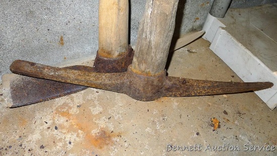 Nice grub hoe with pick and 36" handle, plus an old prospector's pick.