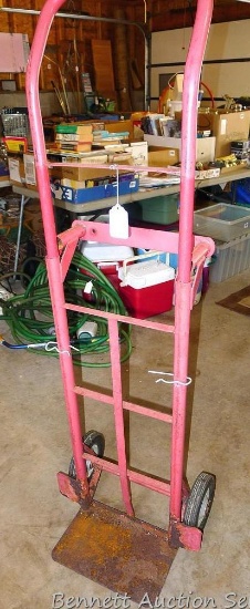 Convertible hand truck stands 5' tall.