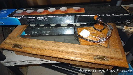 27" oak medicine cabinet plus a strip light and more.