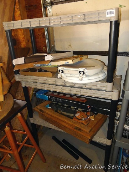 Rust proof shelving unit approx 4-1/2' x 3' x 1-1/4'. Comes with extra shelf and 3 extra risers.