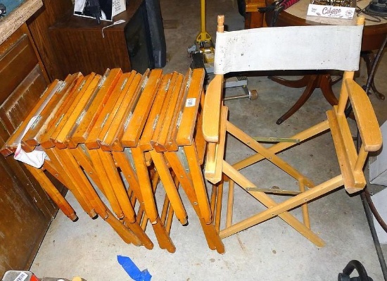 Five directors chairs of various conditions.