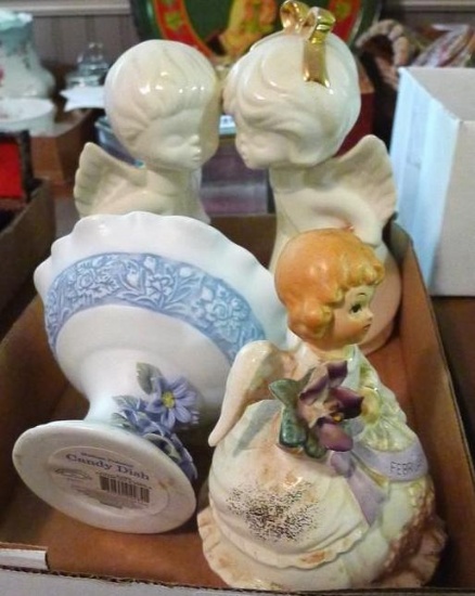 Decorative pieces including musical figurine, kissing angel figurines, footed dish. Musical figurine