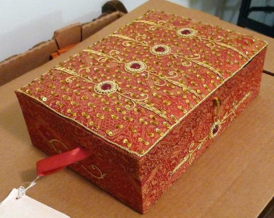 Hand embroidered Indian box with lift out tray is 10" wide and has original tags. Some cloth panels
