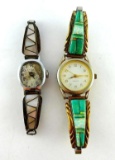 Two ladies watches. One has pretty opal and turquoise colored accents and is marked '1/2012K GF' and