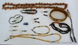 Beaded necklaces, bracelets and earrings, plus a woven bracelet. Longest necklace is 13