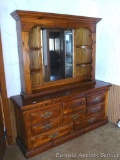 Very nice 8 drawer dresser with mirror and side corner shelves is 70