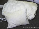 Feather pillow; Down comforter is 72