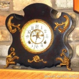 Antique mantle clock made by the New Haven Clock Co., New Haven, Conn. Delightful clock has a