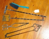 Fireplace tools include tongs, ash scoop, rake and small hand broom.