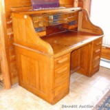 Antique roll top desk is 34