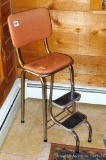 Metal frame stool with fold out steps is 13