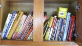 Shelf of great cookbooks includes Betty Crocker, Taste of Home, Better Homes & Gardens, Nestle and