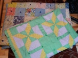 Two handmade tied quilts. Green/yellow one is 76