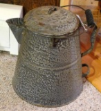 Enameled graniteware coffee pot could have been used in the lumber camps. Stands 16