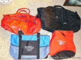 Four duffle bags, largest is 26