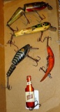 Old fishing lures, some with glass eyes.