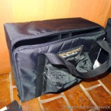 Lakewood professional tackle box has hard sides and nylon shell. New with tags.