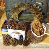 Lot of large pine cones plus 19? pine cone wreath. All are suitable for using as decorations.